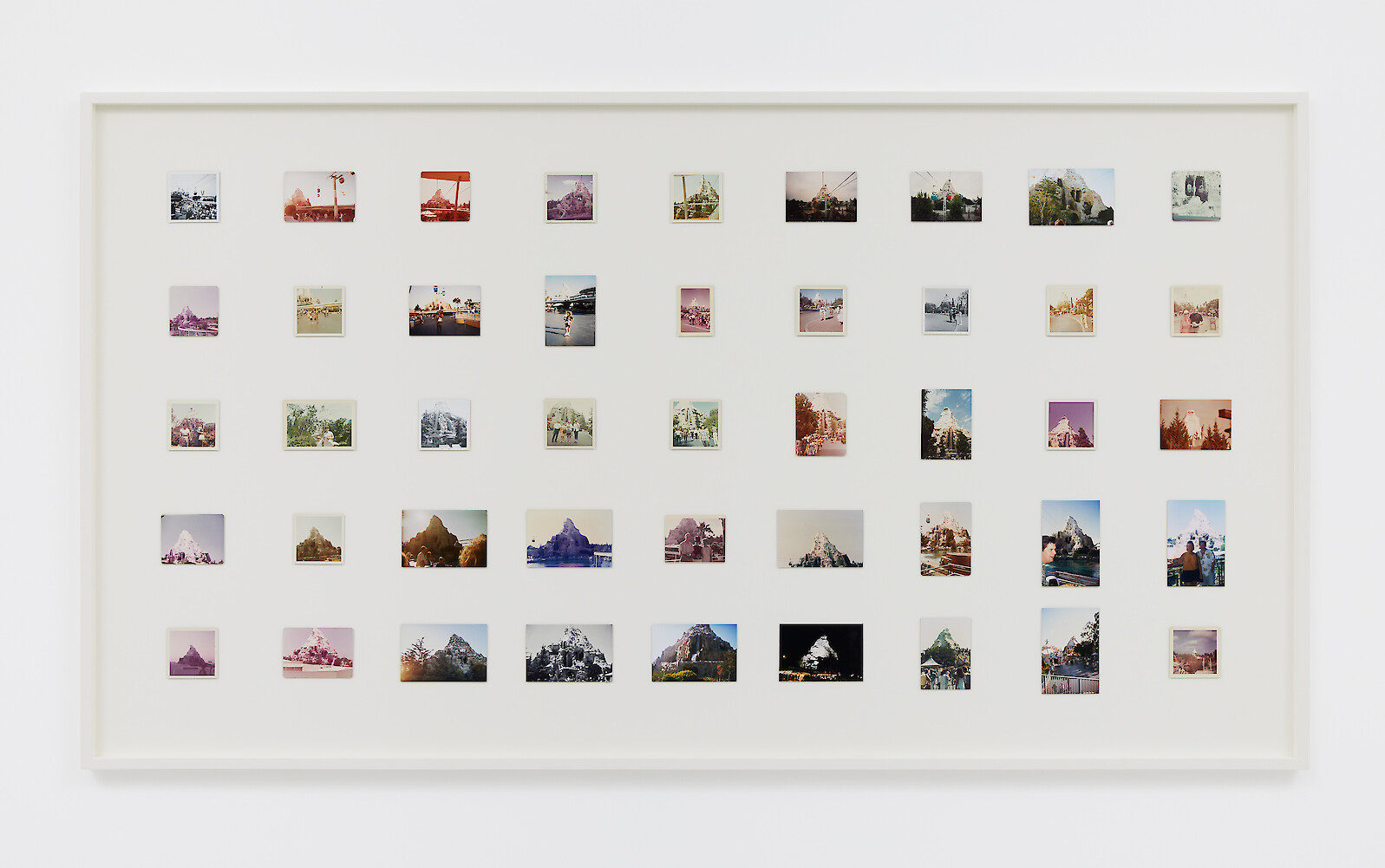 *Ages (Paleocene)*, 2022, 45 found photos dating from 1964–2012, 118 x 214.5 x 5 cm