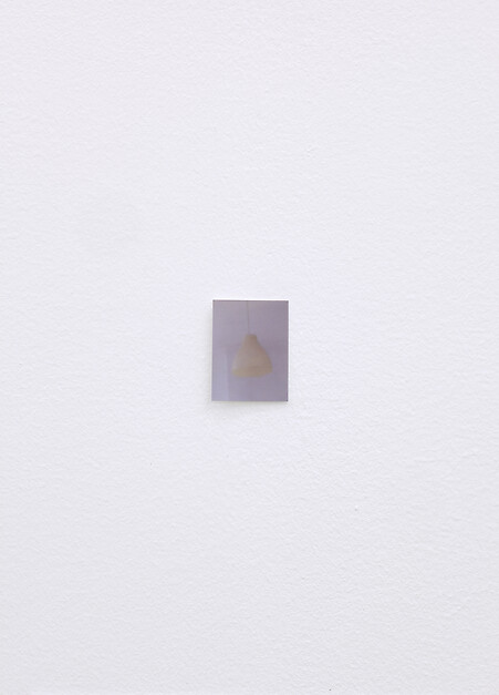 *Lamp Looks in Different Light*, 2013, 6 inkjet prints, 3.5 x 4.5 cm