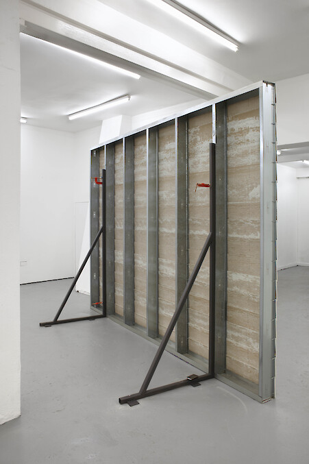 Ed Fornieles, *Monster*, 2011, Hardiplank lapsiding, metal studwork, clamps, iPhone 3G, 261 x 360 x 112 cm