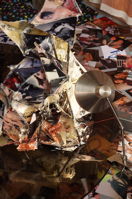 Ed Fornieles, *Dorm Daze*, 2011, Dorm Daze Facebook sitcom, Dorm Daze sitcom photographs, script book, Magic Johnson poster, red NYC cap, sports socks, steel pentagram, glass, silk jersey, computer, projector, popcorn, basketball, pinboard, jacket, voodoo doll